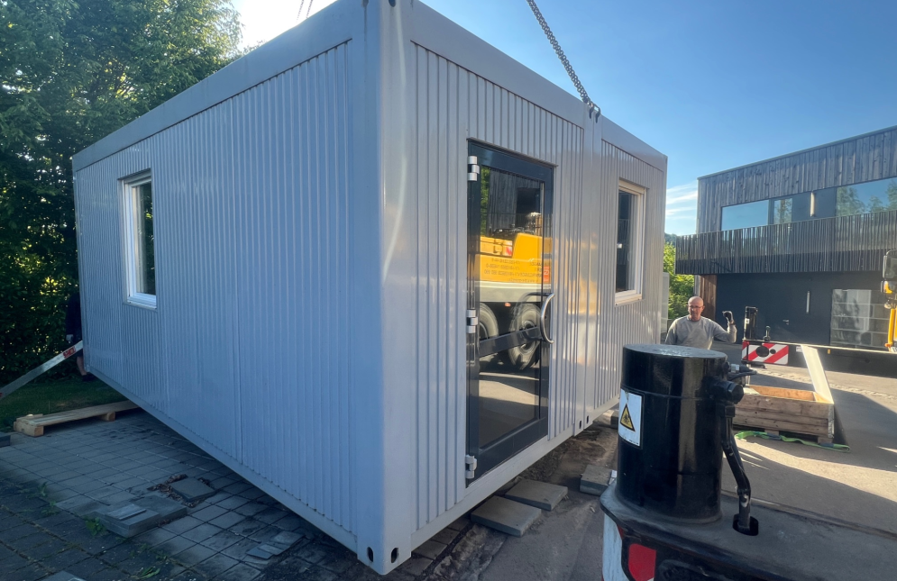 Umsetzen Kannerduerf Container